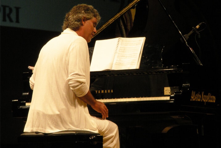 Andrea Bocelli at the piano