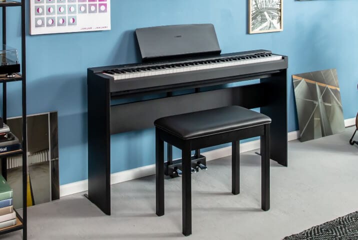 Yamaha P-225 at home with stand