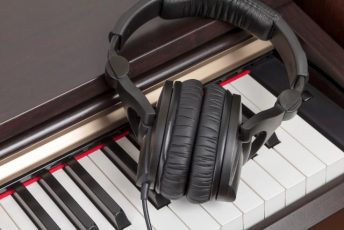 digital piano and headphones