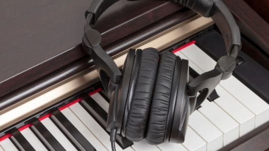 digital piano and headphones